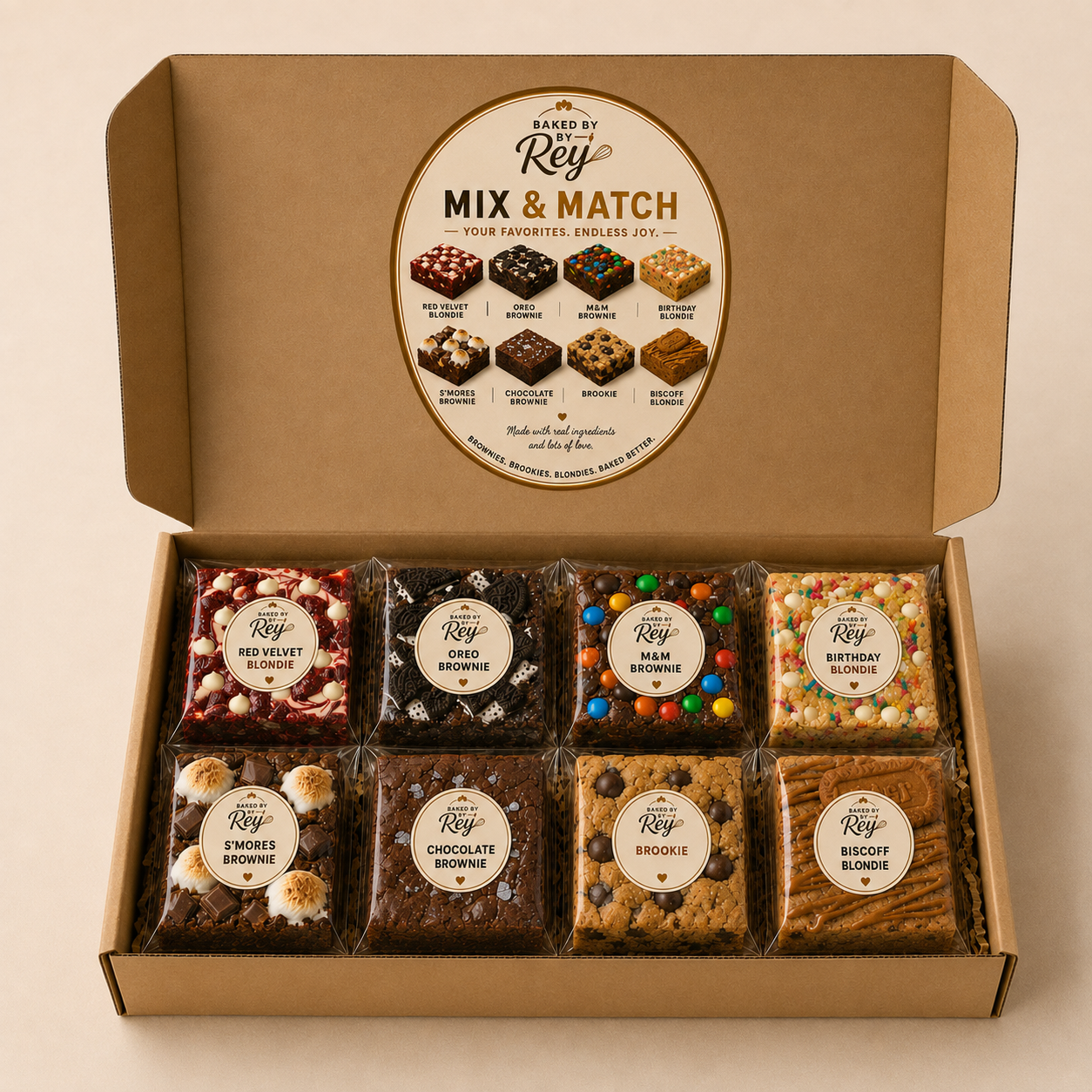 Open Baked by Rey Mix & Match box with eight individually wrapped treats